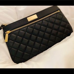 Authentic Mk Quilted clutch